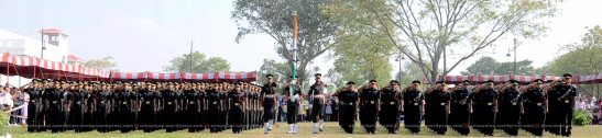 Young officer saluting the Tricolor (Indian-flag)